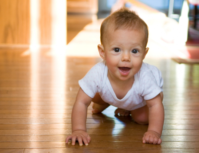 happy toddler crawling