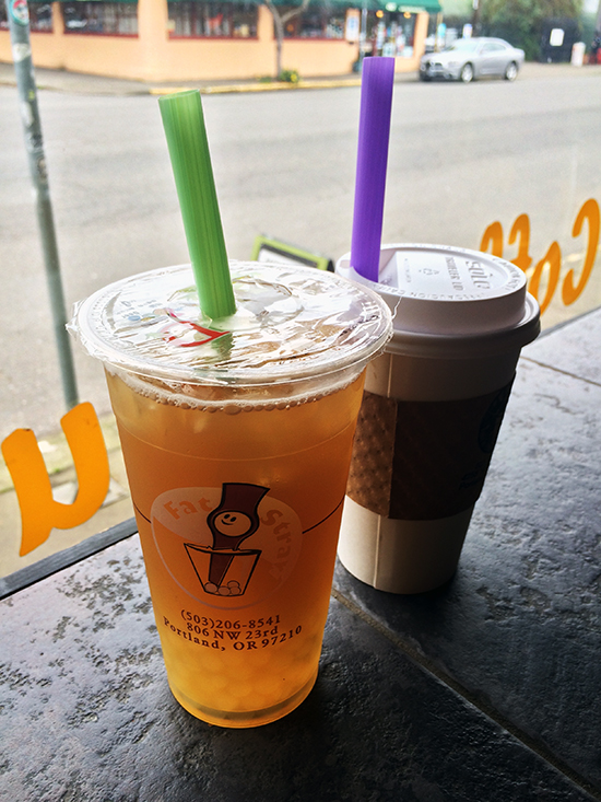 Passion fruit green tea with lychee popping boba and hot taro milk tea with tapioca at Fat Straw