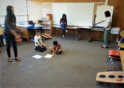 Students have fun working on addition/multiplication and measurement in our Bean Bag Bowl© game!