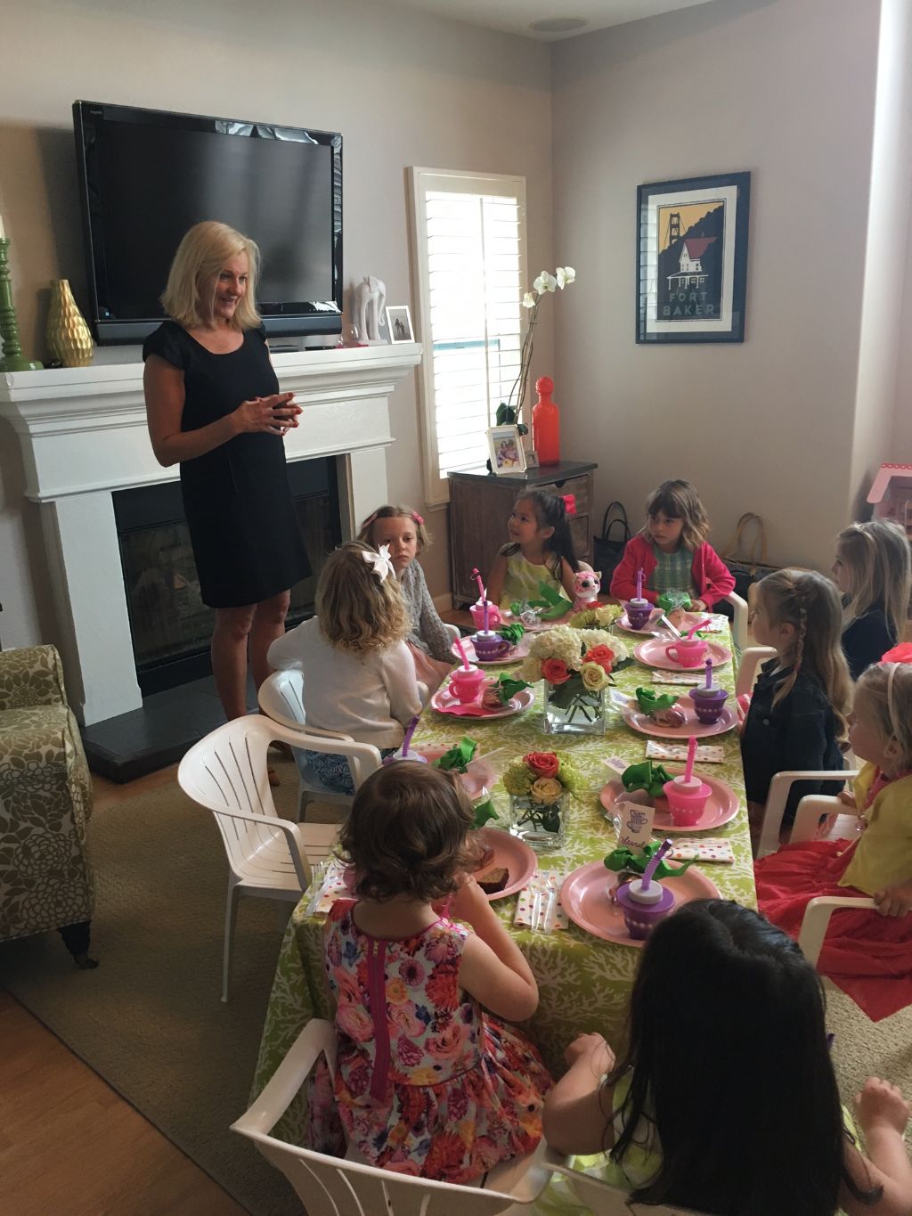 Melanie teaching manners at a birthday party.