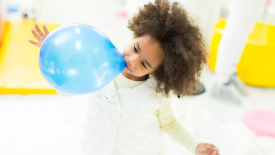 kid with balloon