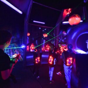 Kids in the mirror room of the laser tag arena