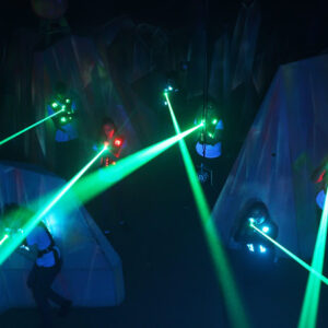 Laser tag players shooting their lasers